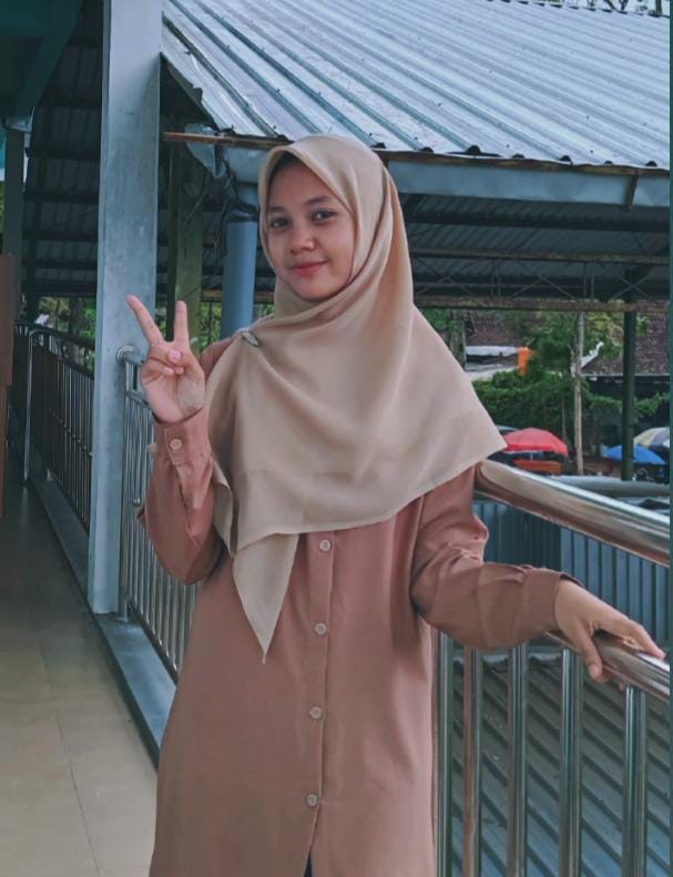 Profile picture of a person standing outside a building